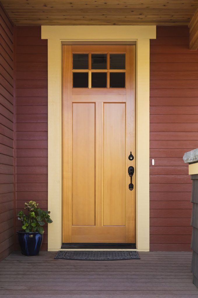 A wooden house door