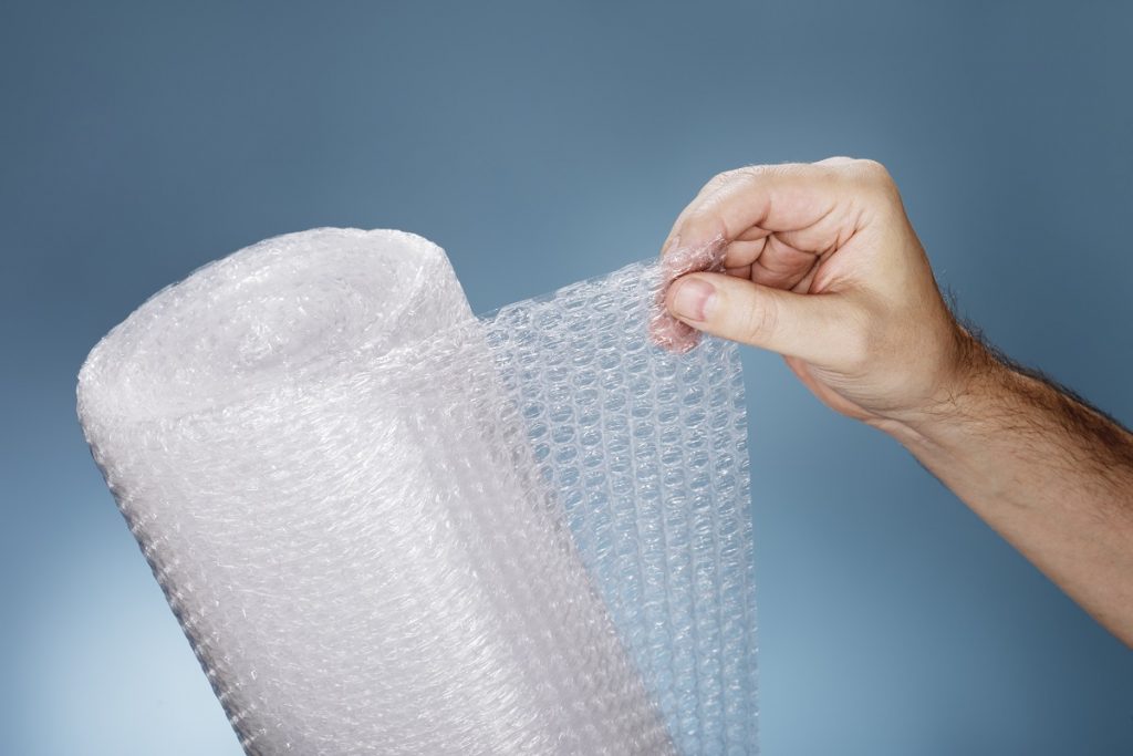 Man holding bubble wrap