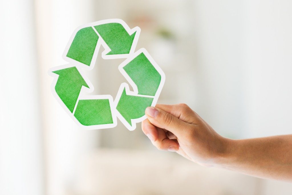 Man holding a recycle paper concept