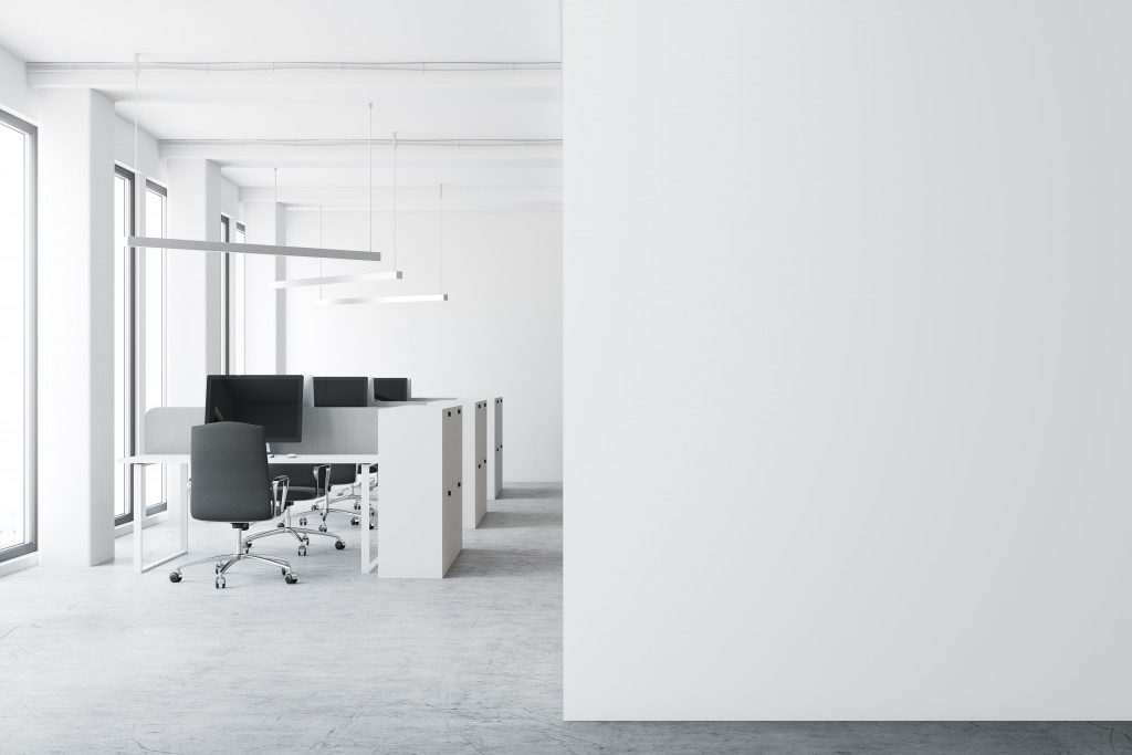 Undecorated office with white walls