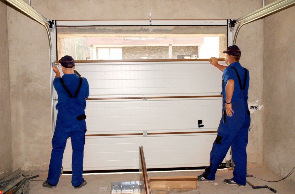 Garage door being repaired