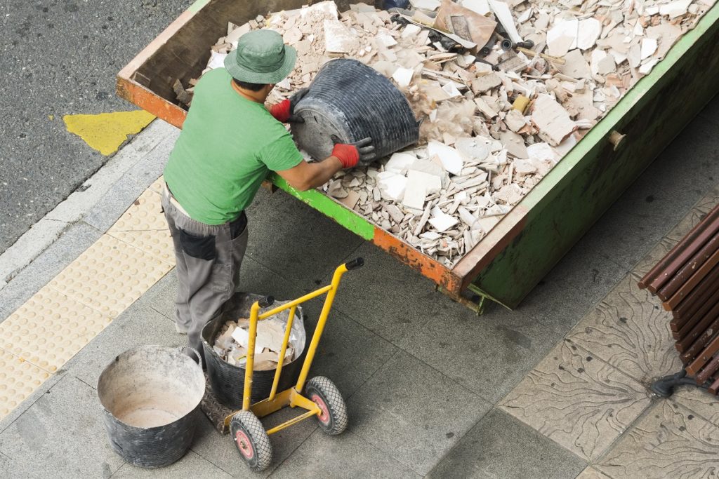 Demolition waste being dumped