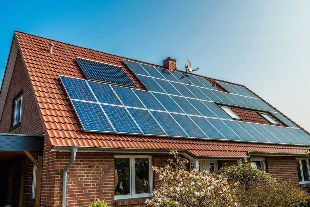 Brick home with solar panels on the roof