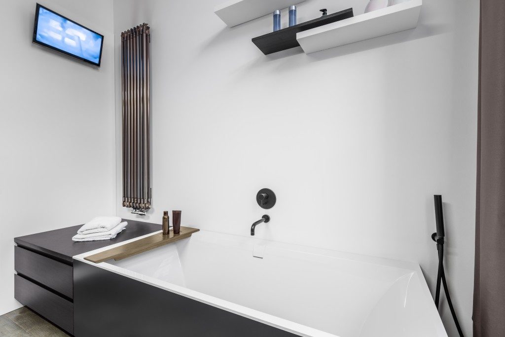 luxury bathtub with television