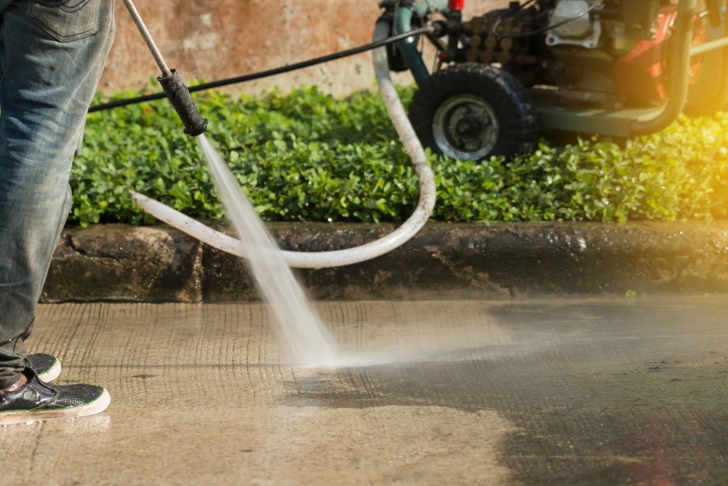 driveway being sprayed