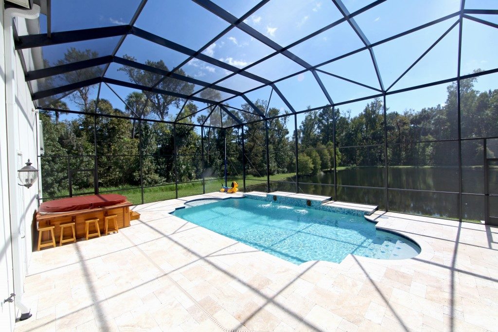 House with a poolside deck